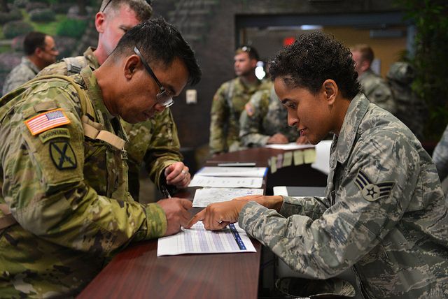 Service members filling out form Image